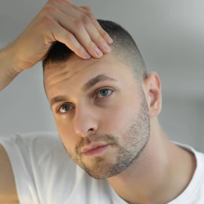 How Does Hair Restoration Compare to Wearing Wigs or Hairpieces